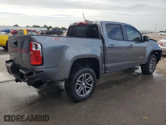 ✅ 2021 Chevrolet Colorado 4WD Work Truck • VIN: 1GCGTBEN3M1215880 • Лот: 61263353. Опубликован ранее на Copart с пробегом 41 125 миль. Бесплатный доступ к архиву аукционных продаж из США и подробный отчёт об истории автомобиля на DreamBid. Изображение 3.