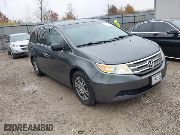 ✅ 2012 Honda Odyssey EX-L • VIN: 5FNRL5H68CB091707 • Lot: 43723624. Listed on IAAI with 184,495 mi. Free auction sales archive from the USA and detailed vehicle history report at DreamBid. Image 1.