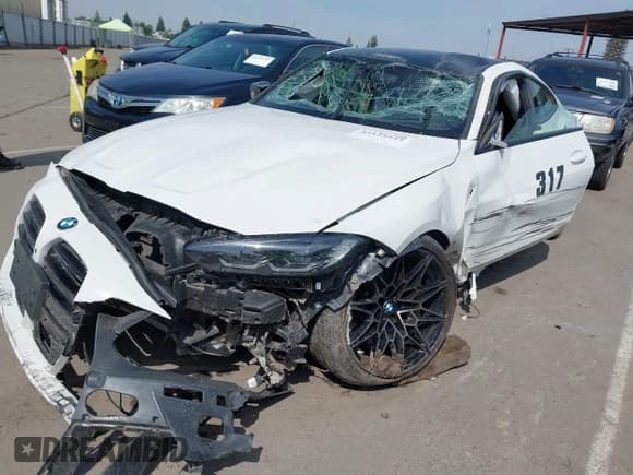 ✅ 2023 BMW M4 Competition xDrive • VIN: WBS43AZ03PCM82921 • Lot: 42122523. Listed on IAAI with 6,567 mi. Free auction sales archive from the USA and detailed vehicle history report at DreamBid. Image 2.