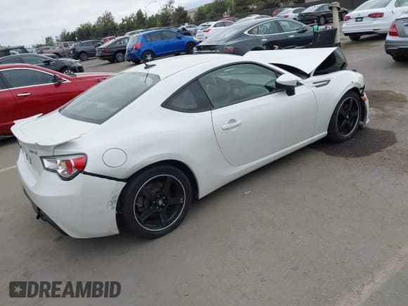 ✅ 2013 Subaru BRZ Limited • VIN: JF1ZCAC18D1609948 • Lot: 43176942. Listed on IAAI with 100,601 mi. Free auction sales archive from the USA and detailed vehicle history report at DreamBid. Image 4.