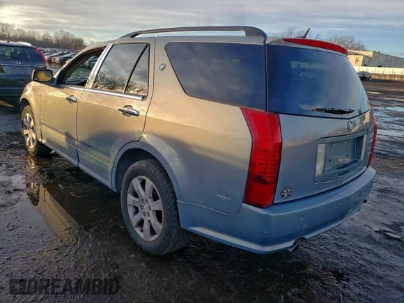 ✅ 2007 Cadillac SRX • VIN: 1GYEE637870157542 • Lot: 94221225. Listed on Copart with 104,111 mi. Free auction sales archive from the USA and detailed vehicle history report at DreamBid. Image 2.