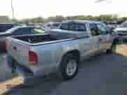 2001 Dodge Dakota z VIN 1B7GL22XX1S166561, wystawiony jako Copart lot #73294634 z przebiegiem 134 754 mil mil oraz Szkoda całkowita • Salvage title. Historia ofert i sprzedaży dostępna na DreamBid. Obrazek 3.