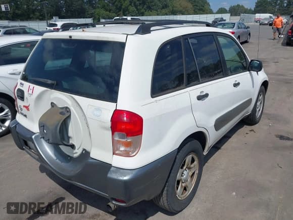 ✅ 2002 Toyota RAV4 • VIN: JTEGH20V820063831 • Lot: 43224430. Listed on IAAI with 250,815 mi. Free auction sales archive from the USA and detailed vehicle history report at DreamBid. Image 4.