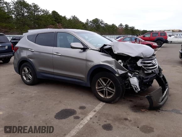 ✅ 2017 Hyundai Santa Fe 2.4L • VIN: 5XYZTDLBXHG418865 • Lot: 72195542. Listed on Copart with 131,058 mi. Free auction sales archive from the USA and detailed vehicle history report at DreamBid. Image 4.