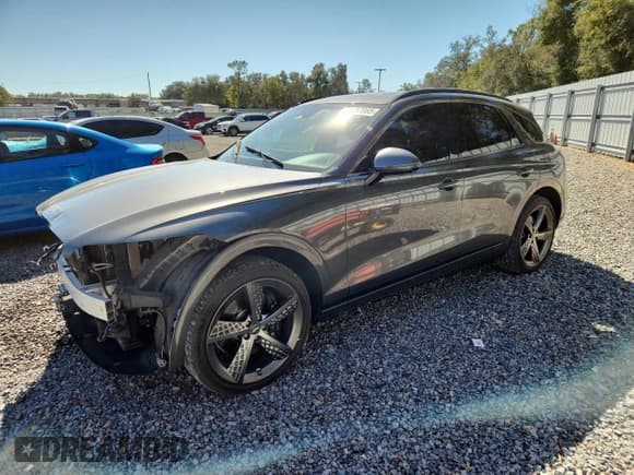 ✅ 2023 Genesis GV70 2.5T • VIN: KMUMADTB7PU100406 • Lot: 92157065. Listed on Copart with 39,810 mi. Free auction sales archive from the USA and detailed vehicle history report at DreamBid. Image 1.