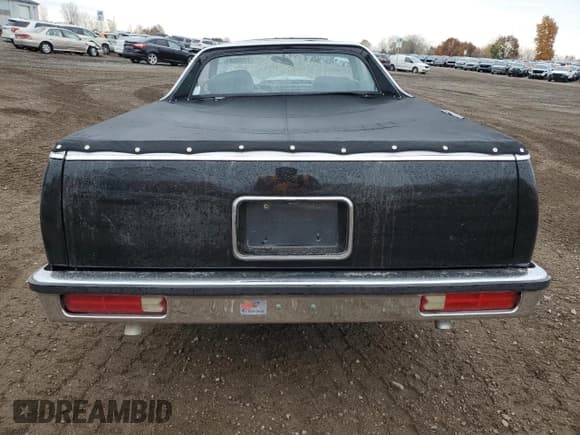 ✅ 1986 GMC Caballero • VIN: 3GTCW80Z1GS801760 • Lot: 77592504. Listed on Copart with 64,797 mi. Free auction sales archive from the USA and detailed vehicle history report at DreamBid. Image 6.