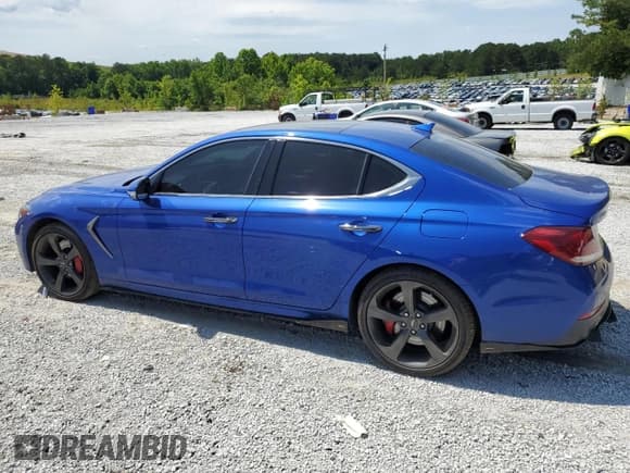 ✅ 2020 Genesis G70 3.3T • VIN: KMTG34LE7LU058061 • Lot: 57534815. Listed on Copart with 76,885 mi. Free auction sales archive from the USA and detailed vehicle history report at DreamBid. Image 2.