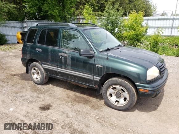 ✅ 2003 Suzuki Vitara JLX • VIN: 2S3TD52V136101732 • Лот: 58477845. Опубликован ранее на Copart с пробегом 105 628 миль. Бесплатный доступ к архиву аукционных продаж из США и подробный отчёт об истории автомобиля на DreamBid. Изображение 4.