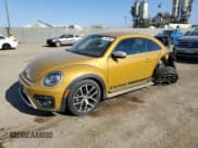 ✅ 2016 Volkswagen Beetle Dune • VIN: 3VWS17AT8GM621269 • Lot: 47991993. Listed on Copart with 51,741 mi. Free auction sales archive from the USA and detailed vehicle history report at DreamBid. Image 1.