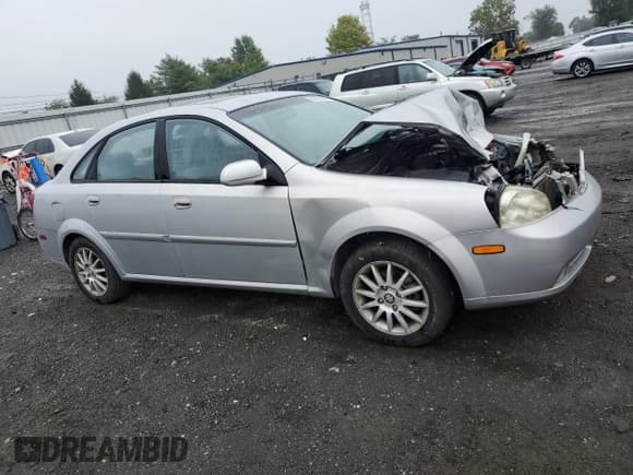 ✅ 2005 Suzuki Forenza LX • VIN: KL5JJ56Z85K132557 • Lot: 80202535. Wystawiony na Copart z przebiegiem Nie podano. Bezpłatny archiwum sprzedaży aukcyjnych z USA i szczegółowy raport historii pojazdu na DreamBid. Zdjęcie 4.