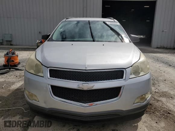 ✅ 2012 Chevrolet Traverse LS • VIN: 1GNKRFED6CJ168289 • Lot: 71892894. Wystawiony na Copart z przebiegiem 73 616 mil. Bezpłatny archiwum sprzedaży aukcyjnych z USA i szczegółowy raport historii pojazdu na DreamBid. Zdjęcie 5.