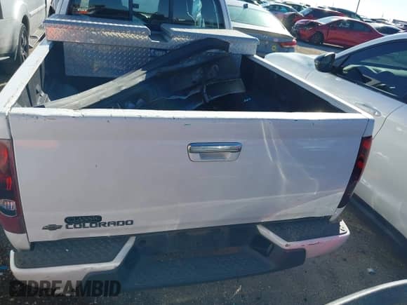 2012 Chevrolet Colorado Work Truck with VIN 1GCESBFE1C8150946, listed as a IAAI auction lot 41556527 with 56,592 mi miles and . Bid and sale history available at DreamBid. Image 17.