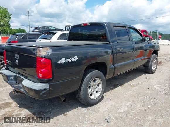 2007 Dodge Dakota SLT with VIN 1D7HW48K17S118416, listed as a IAAI auction lot 42209225 with 133,678 mi miles and . Bid and sale history available at DreamBid. Image 4.