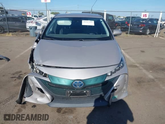✅ 2017 Toyota Prius Plus • VIN: JTDKARFP7H3037054 • Lot: 42147223. Listed on IAAI with 94,834 mi. Free auction sales archive from the USA and detailed vehicle history report at DreamBid. Image 13.