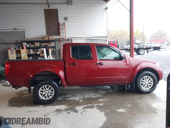 ✅ 2018 Nissan Frontier Pro-4X • VIN: 1N6DD0EV3JN770799 • Lot: 43547945. Listed on IAAI with 99,295 mi. Free auction sales archive from the USA and detailed vehicle history report at DreamBid. Image 13.