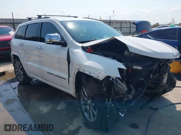 ✅ 2017 Jeep Grand Cherokee Overland • VIN: 1C4RJFCG1HC836961 • Lot: 43054609. Listed on IAAI with 133,975 mi. Free auction sales archive from the USA and detailed vehicle history report at DreamBid. Image 1.
