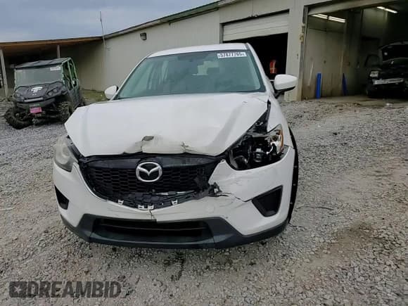 ✅ 2014 Mazda CX-5 Sport • VIN: JM3KE2BE2E0337119 • Lot: 57877765. Listed on Copart with 121,177 mi. Free auction sales archive from the USA and detailed vehicle history report at DreamBid. Image 14.