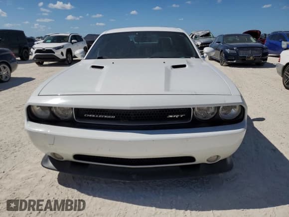 ✅ 2012 Dodge Challenger SRT-8 392 • VIN: 2C3CDYCJ7CH275275 • Lot: 77423314. Wystawiony na Copart z przebiegiem 71 896 mil. Bezpłatny archiwum sprzedaży aukcyjnych z USA i szczegółowy raport historii pojazdu na DreamBid. Zdjęcie 5.
