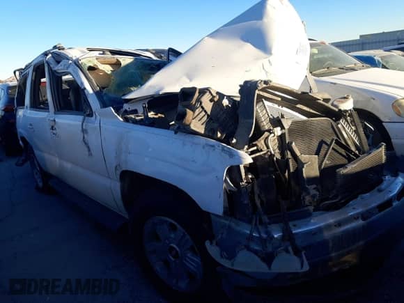 2005 Chevrolet Suburban LT z VIN 3GNEC16Z35G233549, wystawiony jako Copart lot #71860624 z przebiegiem Nie podano mil oraz Nie do naprawy • Non repairable. Historia ofert i sprzedaży dostępna na DreamBid. Obrazek 4.