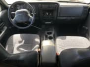 ✅ 2000 Jeep Cherokee • VIN: 1J4FT28P9YL111990 • Lot: 69512375. Listed on Copart with 107,866 mi. Free auction sales archive from the USA and detailed vehicle history report at DreamBid. Image 8.