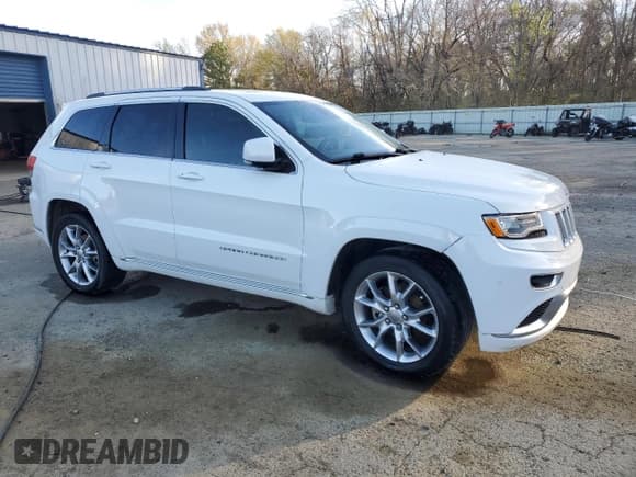 ✅ 2015 Jeep Grand Cherokee Summit • VIN: 1C4RJEJG0FC118974 • Lot: 49002165. Listed on Copart with 112,463 mi. Free auction sales archive from the USA and detailed vehicle history report at DreamBid. Image 4.