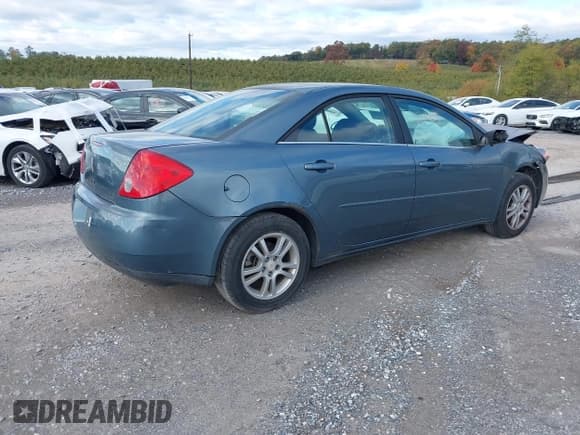 ✅ 2005 Pontiac G6 • VIN: 1G2ZG528454178386 • Lot: 43387065. Wystawiony na IAAI z przebiegiem 194 051 mil. Bezpłatny archiwum sprzedaży aukcyjnych z USA i szczegółowy raport historii pojazdu na DreamBid. Zdjęcie 4.