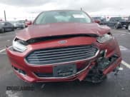 ✅ 2014 Ford Fusion Titanium • VIN: 3FA6P0SUXER114445 • Lot: 43727861. Listed on IAAI with 77,195 mi. Free auction sales archive from the USA and detailed vehicle history report at DreamBid. Image 12.