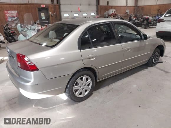 ✅ 2003 Honda Civic LX • VIN: 2HGES16643H948324 • Lot: 43812092. Listed on IAAI with 192,110 mi. Free auction sales archive from the USA and detailed vehicle history report at DreamBid. Image 4.