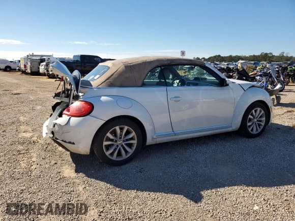 ✅ 2014 Volkswagen Beetle 2.0L TDI • VIN: 3VW5L7AT5EM806416 • Lot: 86837594. Listed on Copart with 263,447 mi. Free auction sales archive from the USA and detailed vehicle history report at DreamBid. Image 3.