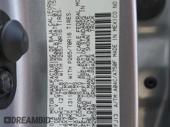 ✅ 2015 Toyota Tacoma • VIN: 3TMLU4EN0FM205580 • Lot: 85667644. Listed on Copart with 60,806 mi. Free auction sales archive from the USA and detailed vehicle history report at DreamBid. Image 12.