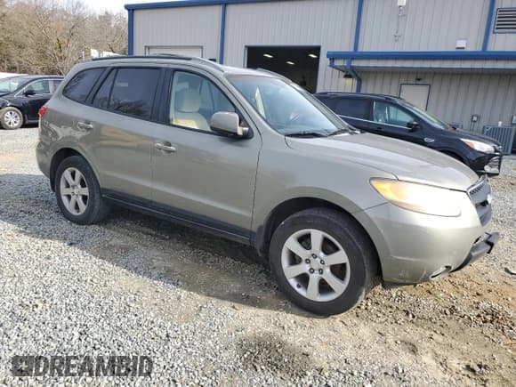 ✅ 2007 Hyundai Santa Fe SE • VIN: 5NMSH73E27H110155 • Lot: 84842354. Listed on Copart with 245,947 mi. Free auction sales archive from the USA and detailed vehicle history report at DreamBid. Image 4.