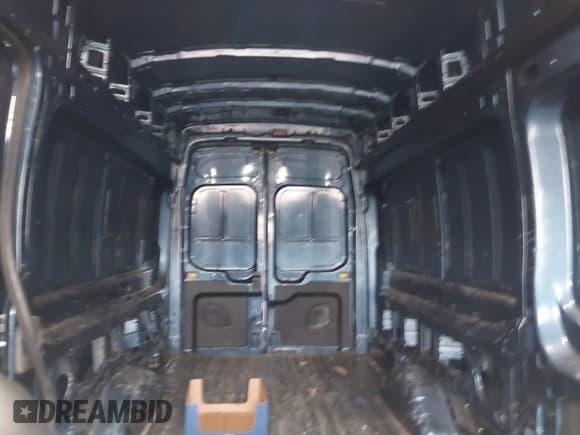 ✅ 2023 Ford Transit Cargo • VIN: 1FTBR3X86PKA19968 • Lot: 41587524. Listed on IAAI with 44,987 mi. Free auction sales archive from the USA and detailed vehicle history report at DreamBid. Image 8.