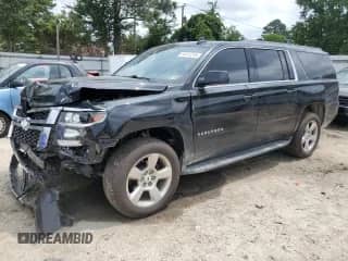 2020 Chevrolet Suburban LS с VIN 1GNSCGKC4LR237498, выставлен на аукционе Copart как лот 64017215 с пробегом 115 681 миль миль и Списание • Salvage title. История ставок и продаж доступна на DreamBid. Изображение 1.