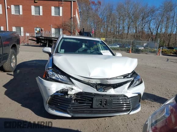 2022 Toyota Camry Hybrid XLE with VIN 4T1F31AK4NU599424, listed as a IAAI auction lot 40839336 with 68,918 mi miles and . Bid and sale history available at DreamBid. Image 12.