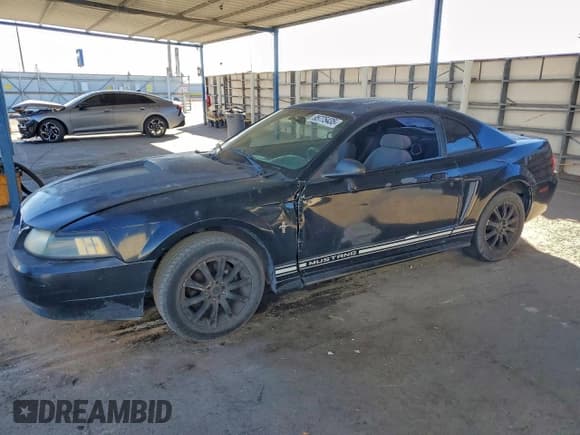 ✅ 2001 Ford Mustang Standard • VIN: 1FAFP404X1F224929 • Lot: 95775435. Listed on Copart with 185,820 mi. Free auction sales archive from the USA and detailed vehicle history report at DreamBid. Image 1.