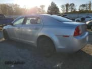 ✅ 2012 Chevrolet Malibu 1LS • VIN: 1G1ZB5E09CF357419 • Lot: 75650164. Listed on Copart with 150,496 mi. Free auction sales archive from the USA and detailed vehicle history report at DreamBid. Image 2.