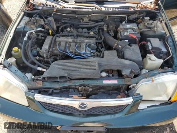 ✅ 2000 Mazda Protege ES • VIN: JM1BJ2239Y0268002 • Lot: 81656605. Listed on Copart with 233,894 mi. Free auction sales archive from the USA and detailed vehicle history report at DreamBid. Image 11.
