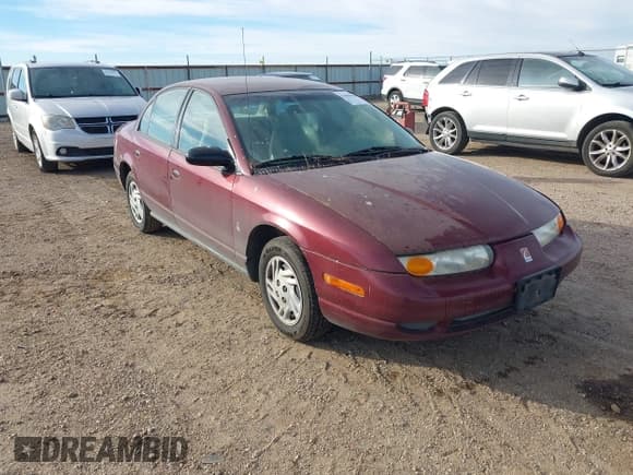 ✅ 2002 Saturn SL • VIN: 1G8ZF52822Z165725 • Lot: 43860858. Listed on IAAI with 191,469 mi. Free auction sales archive from the USA and detailed vehicle history report at DreamBid. Image 1.