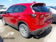 ✅ 2015 Mazda CX-5 Touring • VIN: JM3KE2CY2F0510101 • Lot: 43273950. Listed on IAAI with 128,283 mi. Free auction sales archive from the USA and detailed vehicle history report at DreamBid. Image 3.