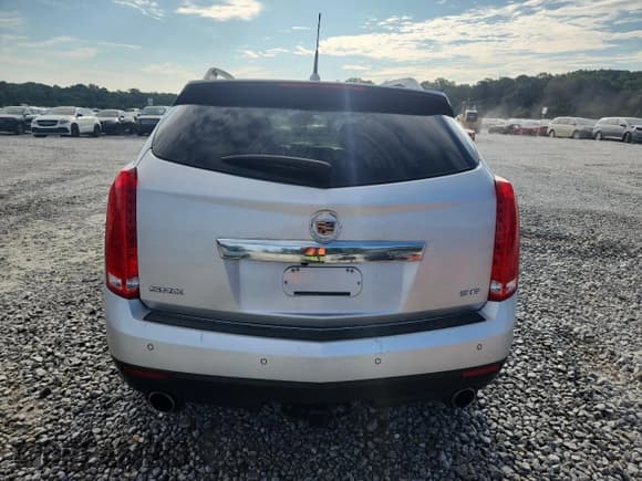 ✅ 2012 Cadillac SRX Performance Collection • VIN: 3GYFNBE36CS582753 • Lot: 70907965. Listed on Copart with 85,563 mi. Free auction sales archive from the USA and detailed vehicle history report at DreamBid. Image 6.