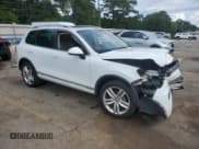 ✅ 2013 Volkswagen Touareg Lux • VIN: WVGEF9BP4DD013167 • Lot: 60422255. Listed on Copart with 157,319 mi. Free auction sales archive from the USA and detailed vehicle history report at DreamBid. Image 4.