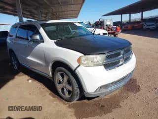 ✅ 2013 Dodge Durango Citadel • VIN: 1C4SDHET0DC690982 • Lot: 43392470. Listed on IAAI with 210,656 mi. Free auction sales archive from the USA and detailed vehicle history report at DreamBid. Image 1.