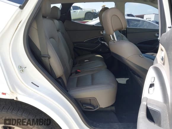 ✅ 2017 Hyundai Santa Fe Ultimate • VIN: 5NMZW4LA1HH042352 • Lot: 42753102. Listed on IAAI with 86,473 mi. Free auction sales archive from the USA and detailed vehicle history report at DreamBid. Image 8.