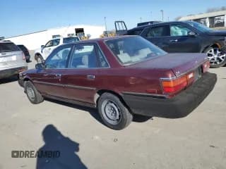 ✅ 1990 Toyota Camry • VIN: JT2SV21E7L3411990 • Lot: 88557555. Listed on Copart with 335,803 mi. Free auction sales archive from the USA and detailed vehicle history report at DreamBid. Image 2.