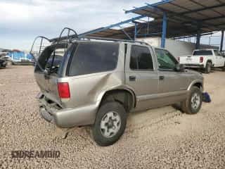2003 Chevrolet Blazer LS z VIN 1GNDT13X73K112544, wystawiony jako Copart lot #83819714 z przebiegiem 96 738 mil mil oraz Szkoda całkowita • Salvage title. Historia ofert i sprzedaży dostępna na DreamBid. Obrazek 3.