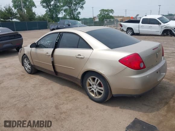 ✅ 2005 Pontiac G6 • VIN: 1G2ZG528854126436 • Lot: 42484292. Wystawiony na IAAI z przebiegiem 201 776 mil. Bezpłatny archiwum sprzedaży aukcyjnych z USA i szczegółowy raport historii pojazdu na DreamBid. Zdjęcie 3.