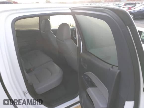 2021 Chevrolet Colorado 4WD Work Truck z VIN 1GCGTBEN6M1101386, wystawiony jako IAAI lot #43551823 z przebiegiem 67 485 mil mil oraz . Historia ofert i sprzedaży dostępna na DreamBid. Obrazek 8.