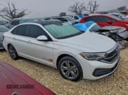 ✅ 2024 Volkswagen Jetta SE • VIN: 3VW7M7BU4RM013904 • Lot: 96395945. Listed on Copart with 35,619 mi. Free auction sales archive from the USA and detailed vehicle history report at DreamBid. Image 4.