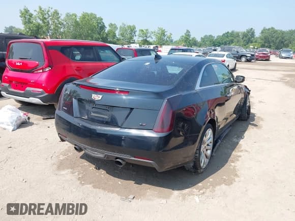 ✅ 2017 Cadillac ATS AWD • VIN: 1G6AG1RX4H0184654 • Lot: 42732017. Listed on IAAI with 110,648 mi. Free auction sales archive from the USA and detailed vehicle history report at DreamBid. Image 4.