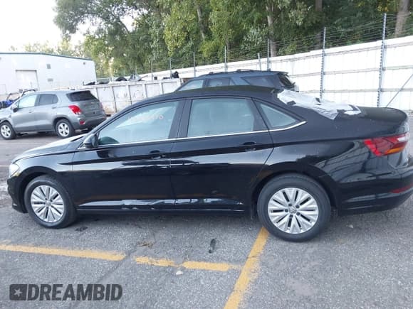 ✅ 2019 Volkswagen Jetta S • VIN: 3VWN57BU9KM099995 • Lot: 43085470. Wystawiony na IAAI z przebiegiem 75 775 mil. Bezpłatny archiwum sprzedaży aukcyjnych z USA i szczegółowy raport historii pojazdu na DreamBid. Zdjęcie 14.